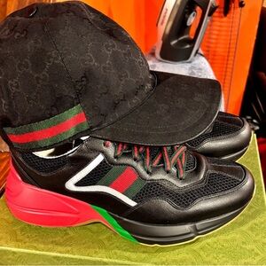 Black Cap and Sneakers with Red and Green Accents Gucci Rhytons